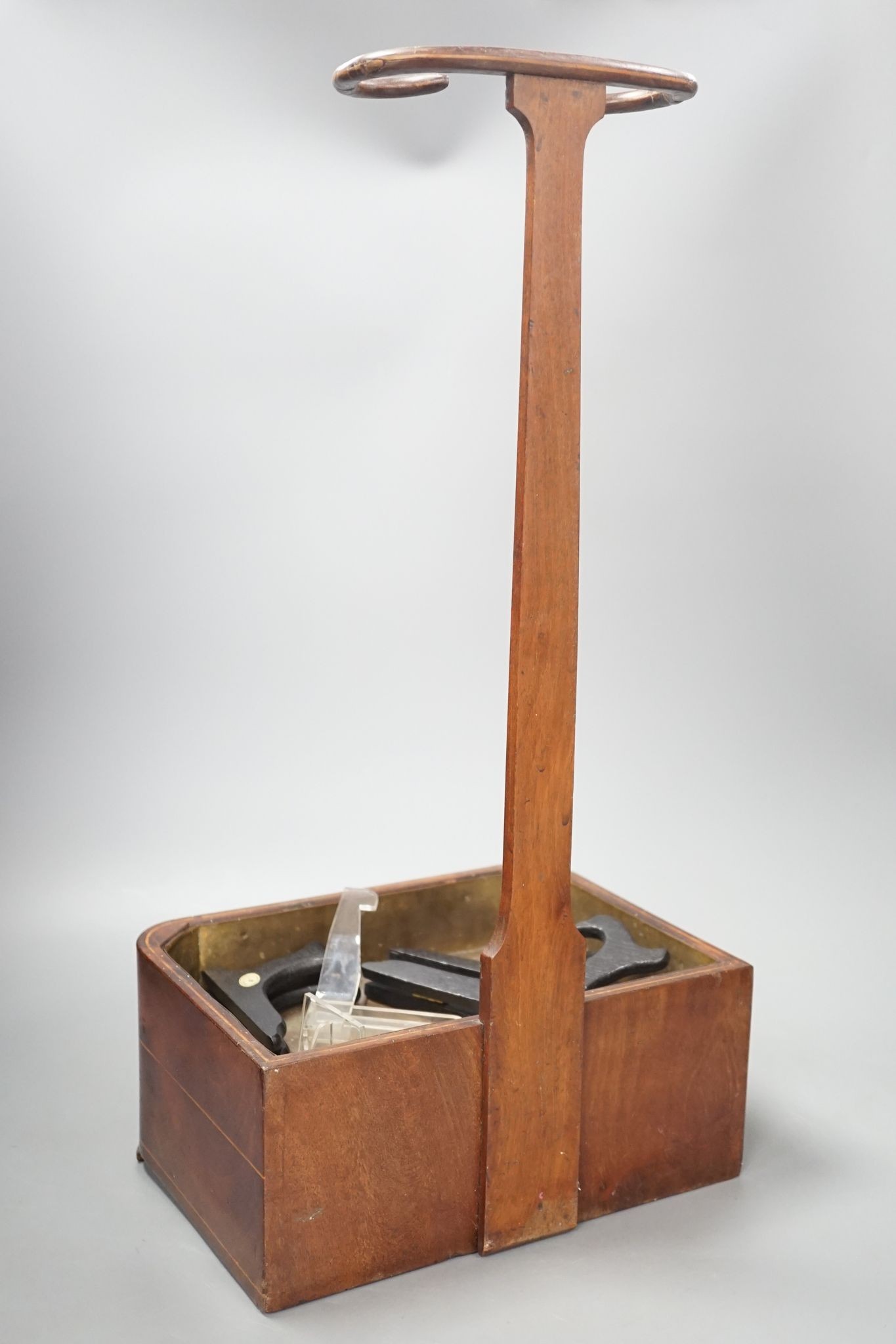 A 19th century satinwood strung mahogany stick stand with fitted drawer, 54 cms high.